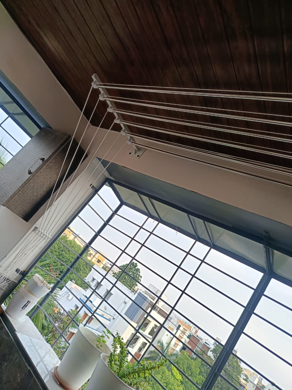 Ceiling mount cloth hanger on a balcony — Varahi Enterprises OMR Chennai installation