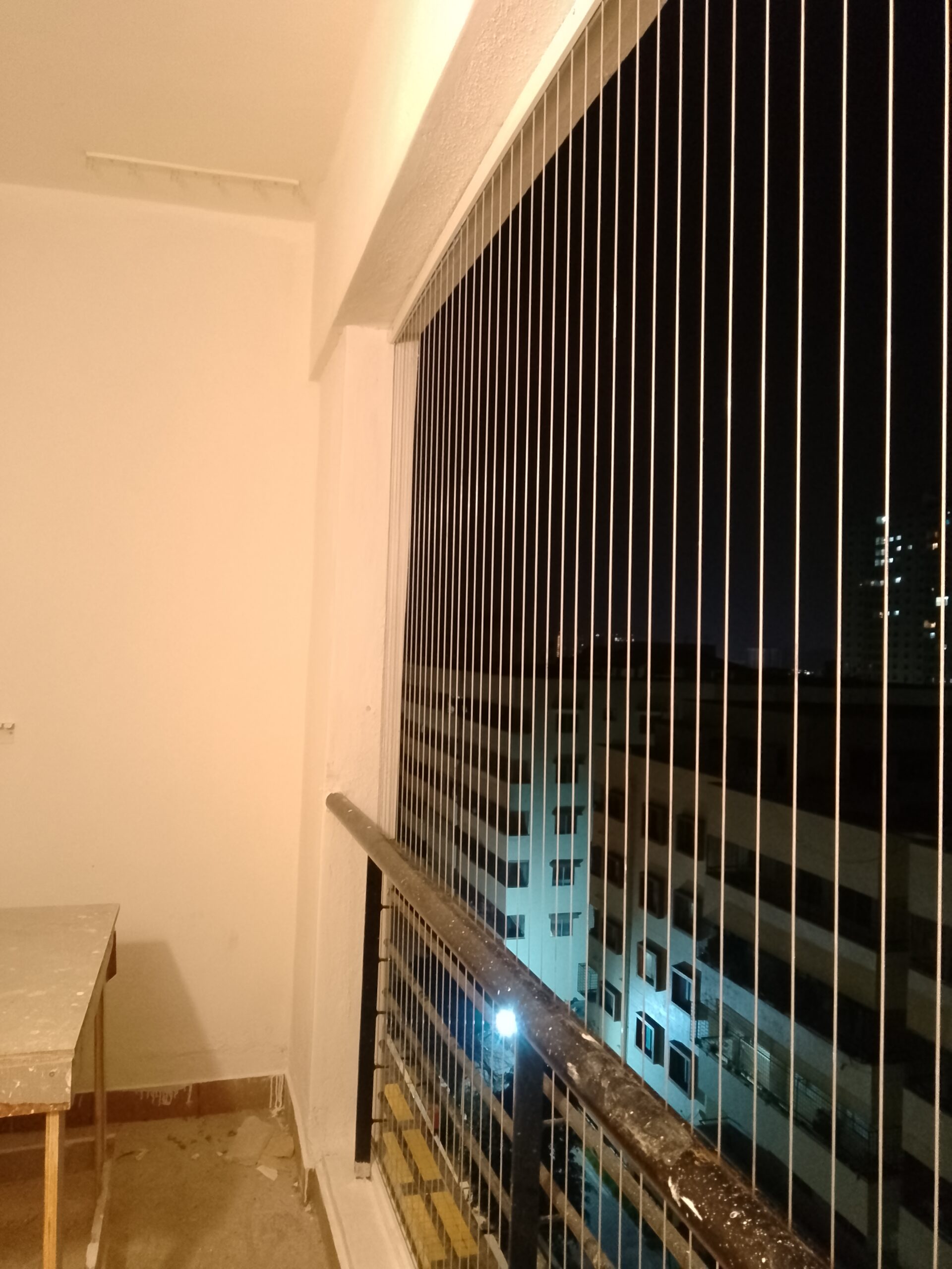 Large balcony invisible grill Porur Chennai by Varahi Enterprises