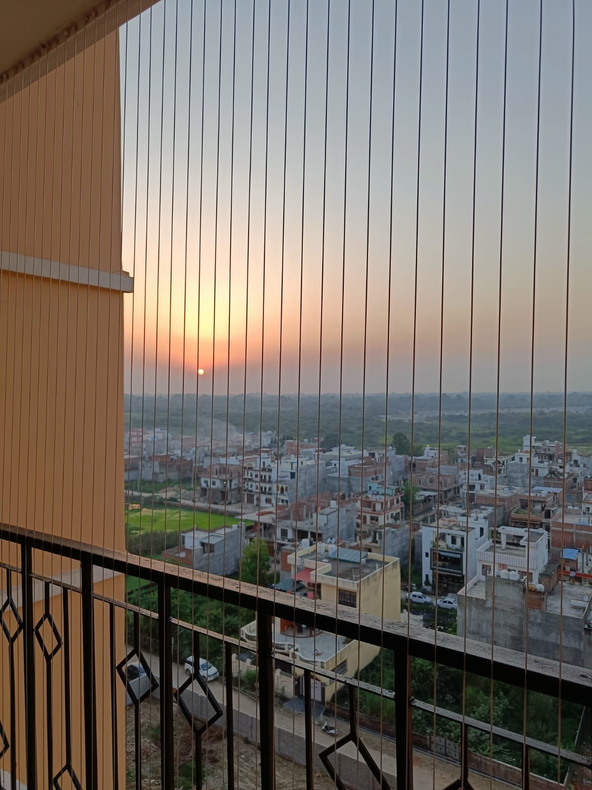 Modern invisible grill on a Chennai balcony — thin SS316 cables, clear view, premium appearance by Varahi Enterprises