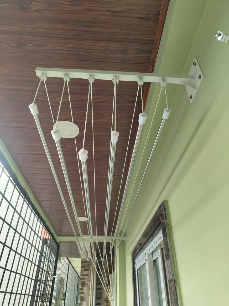 Wall mount cloth hanger installation in Chennai by Varahi Enterprises